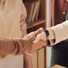 Two colleagues shaking hands